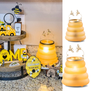 Scentsy Beehive Warmer in honeycomb-inspired design glowing softly.